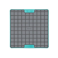 A turquoise square hard case rubber mat with squares inside.