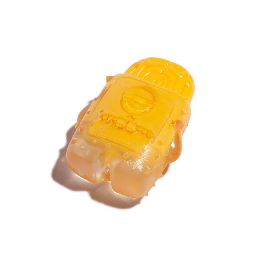 ZeeDog Brain Fried Banana chew toy with brains on top with the product laying flat