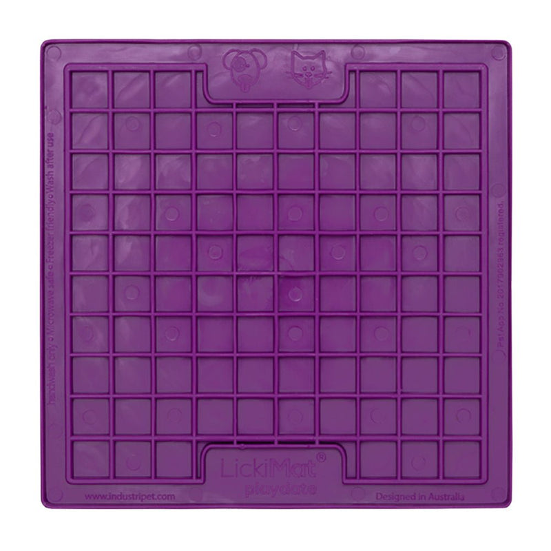 A purple square rubber mat that has small squares inside.