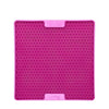 A pink square hard case rubber mat with small numbs inside.